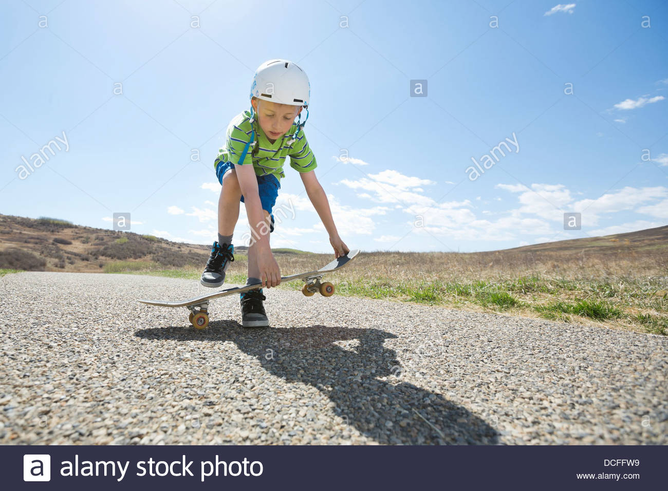 Little boy skateboarding on pathway hires stock photography and images Alamy