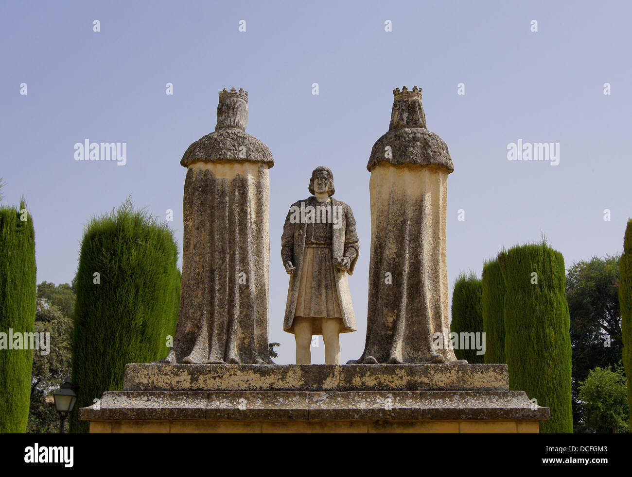 Christopher Colombus between King Fernando of Aragon and Isabel of Castile ('Los Reyes Catolicos'), group of statues in the gard Stock Photo