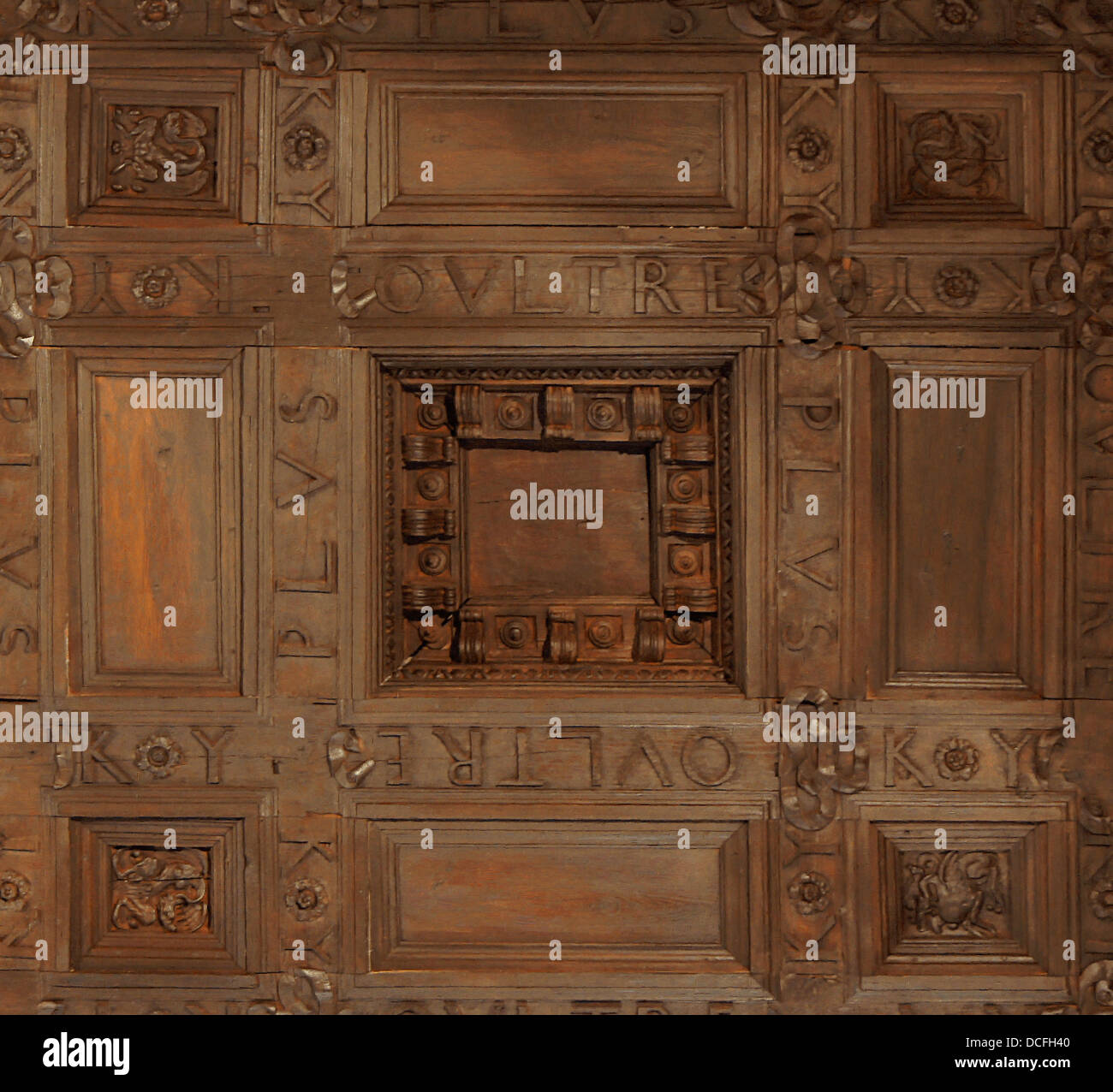 Part of a coffered wooden ceiling in the 'Emperors Chamber' of Alhambra of Granada, Spain. It shows the motto 'Plus Oultre' of C Stock Photo