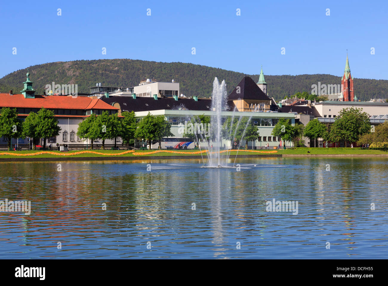 View across Lille Lungegardsvann lake with water fountain to the Kode Art Museums in Bergen, Hordaland, Norway, Scandinavia Stock Photo
