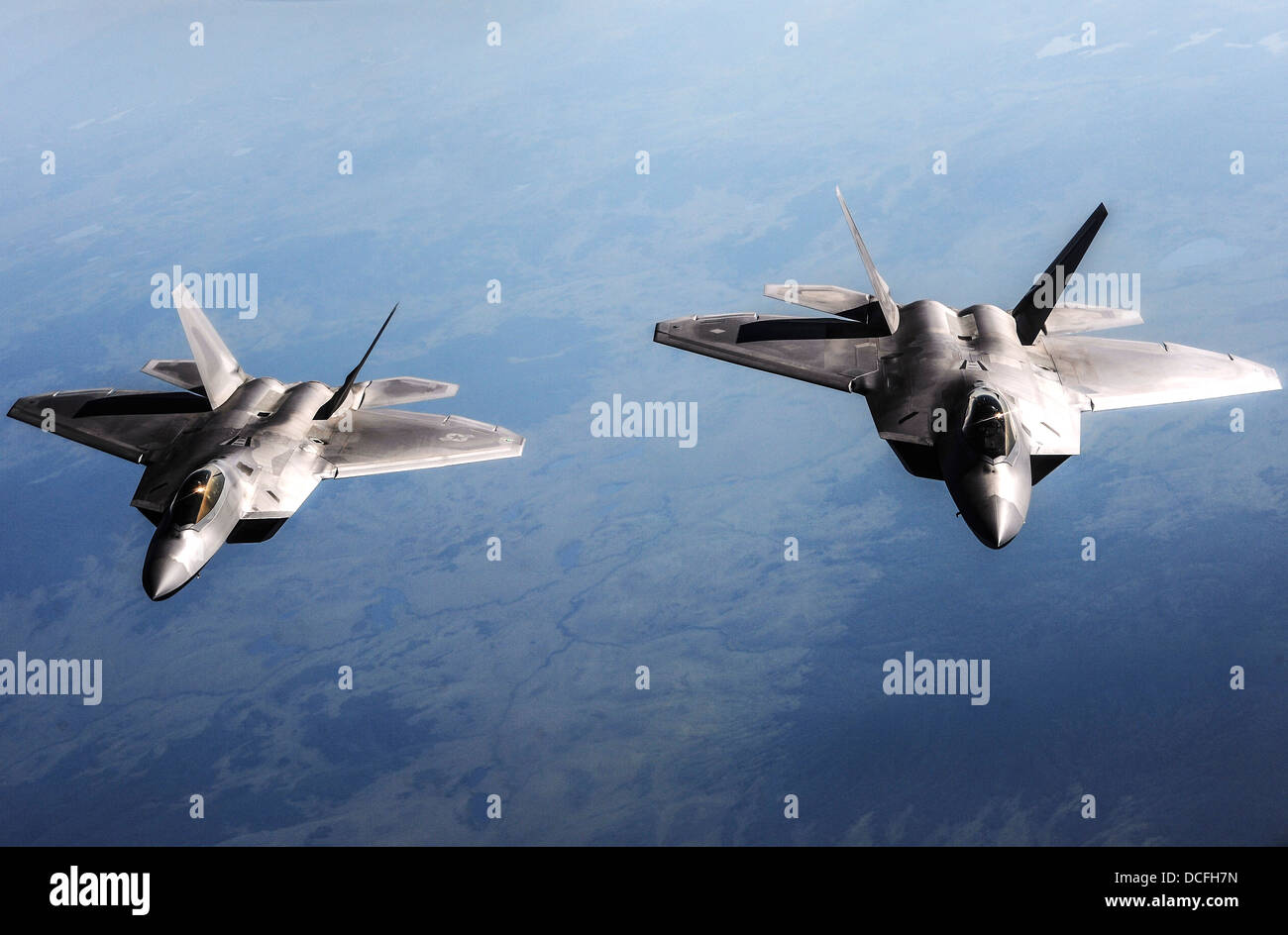 US Air Force F-22 Raptor stealth fighter aircraft fly in formation during Red Flag Alaska 1 over the Joint Pacific Alaska Range Complex August 14, 2013. Stock Photo