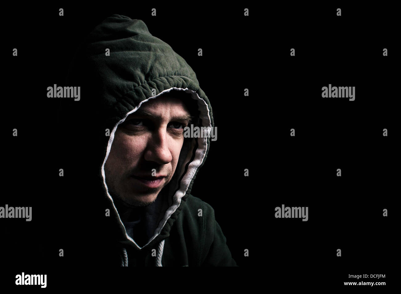 Hooded thug Stock Photo