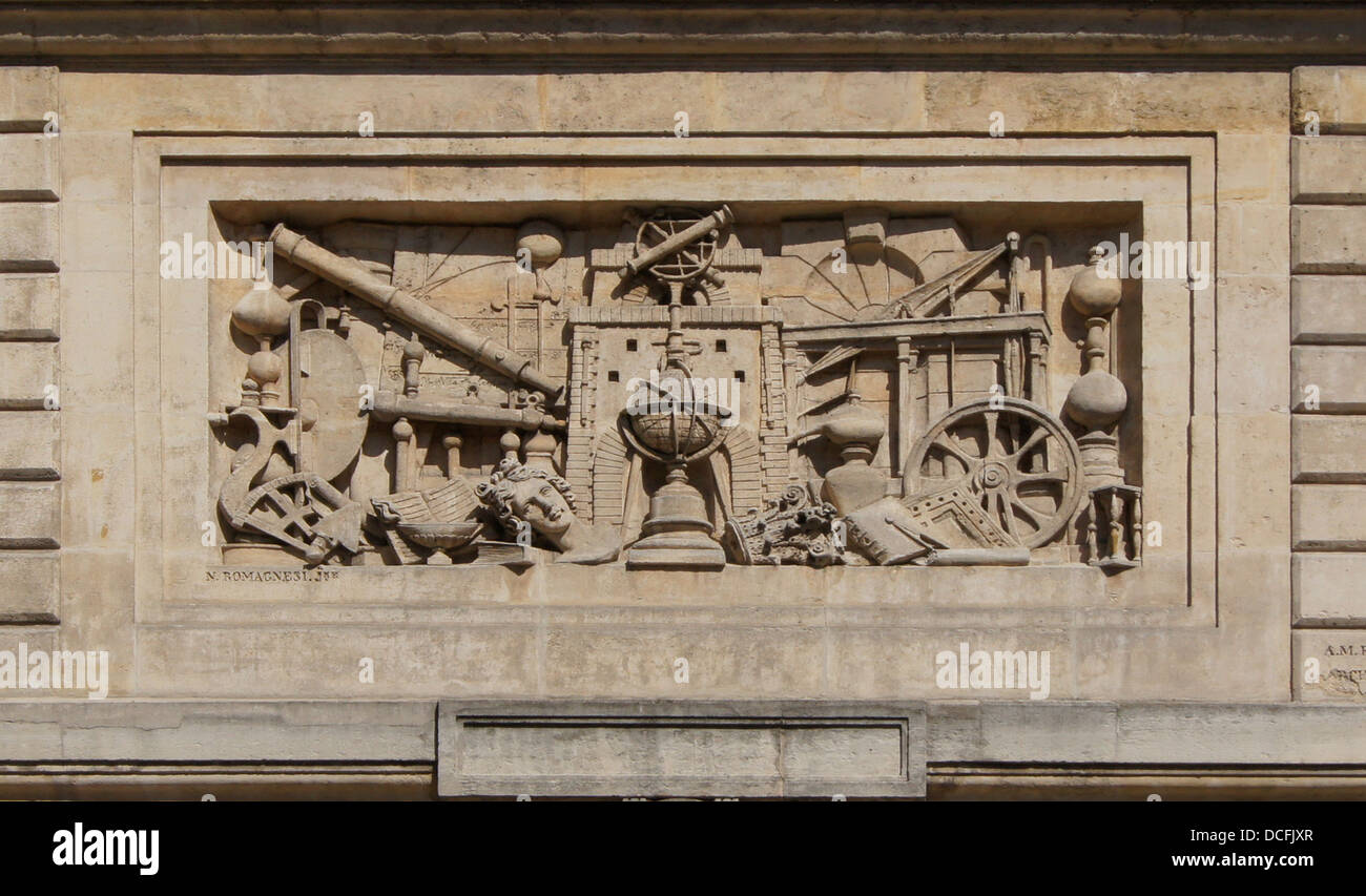 bas-relief with symbols of sciences, old "Ecole Polytechnique", Paris. Perspective correction with "The Gimp" Stock Photo