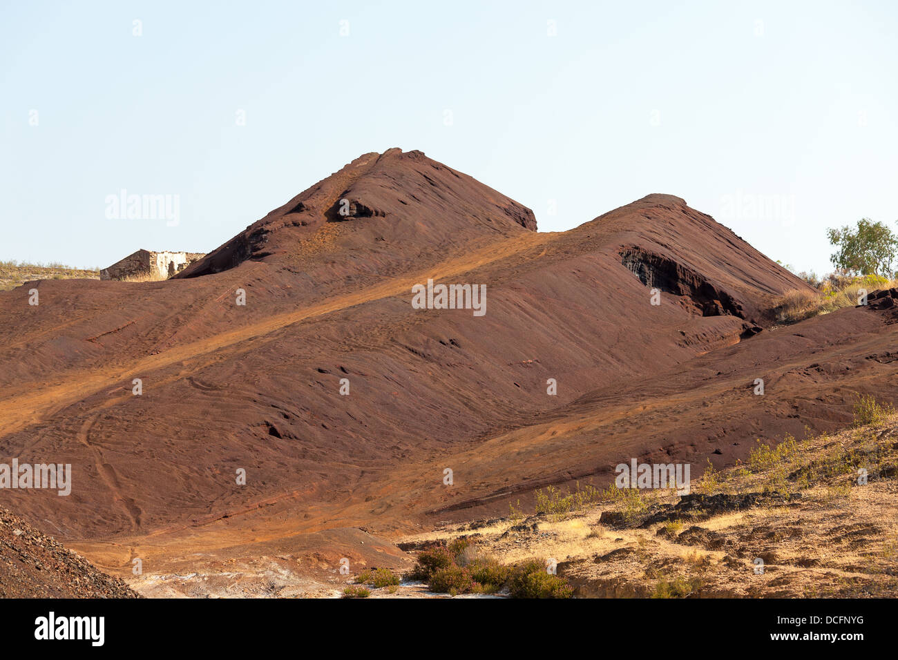 Copper mine tailings or refuse heaps remaining at a mine after the ore has been processed Stock Photo