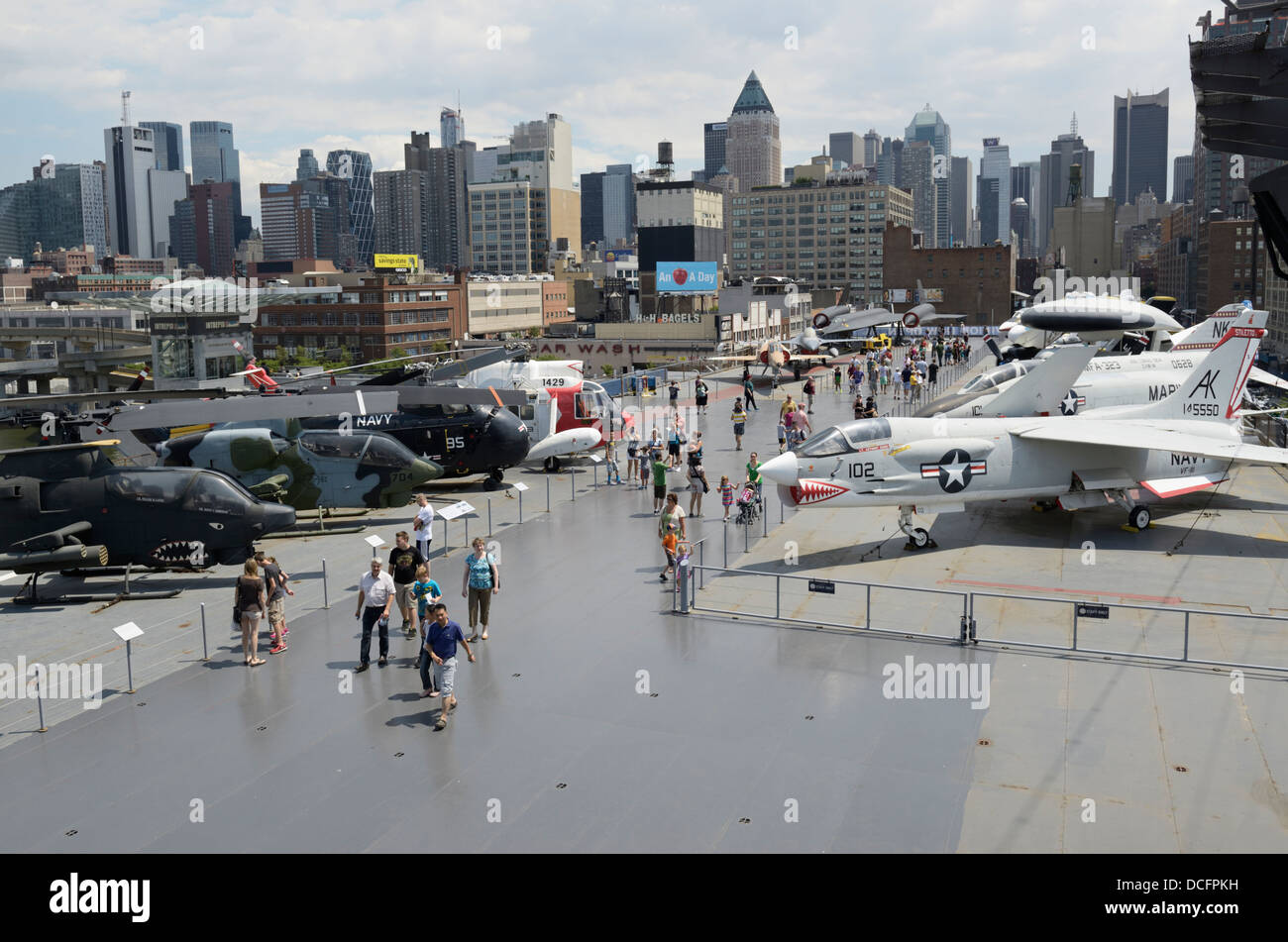Tourists walking the deck of the Intrepid aircraft carrier, Intrepid Sea, Air and Space Museum, NY Stock Photo