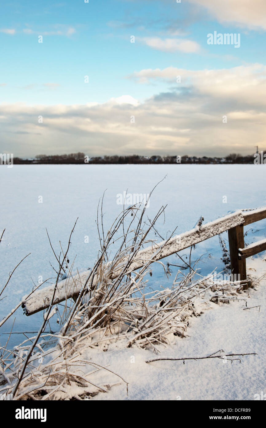 Snow-Covered Rustic Fence; Whitburn, Tyne And Wear, England Stock Photo
