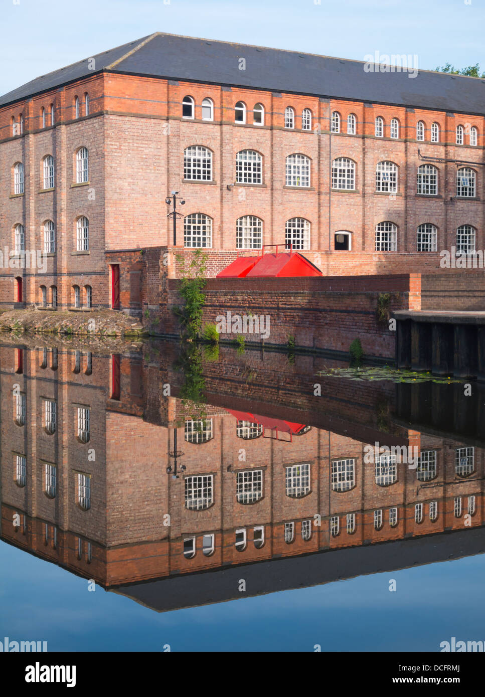 Reflection of building in water. Stock Photo