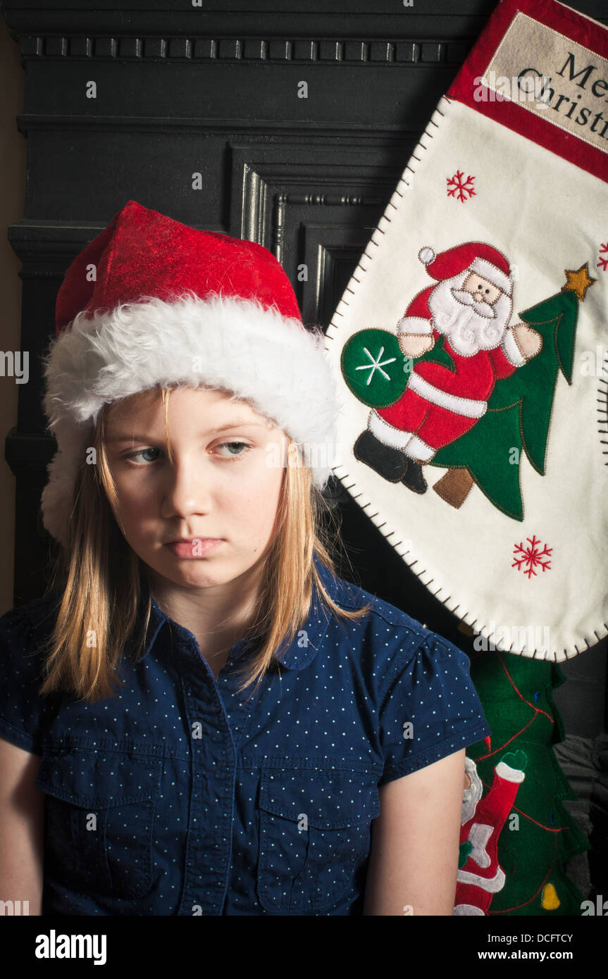 Sad girl at Christmas time Stock Photo