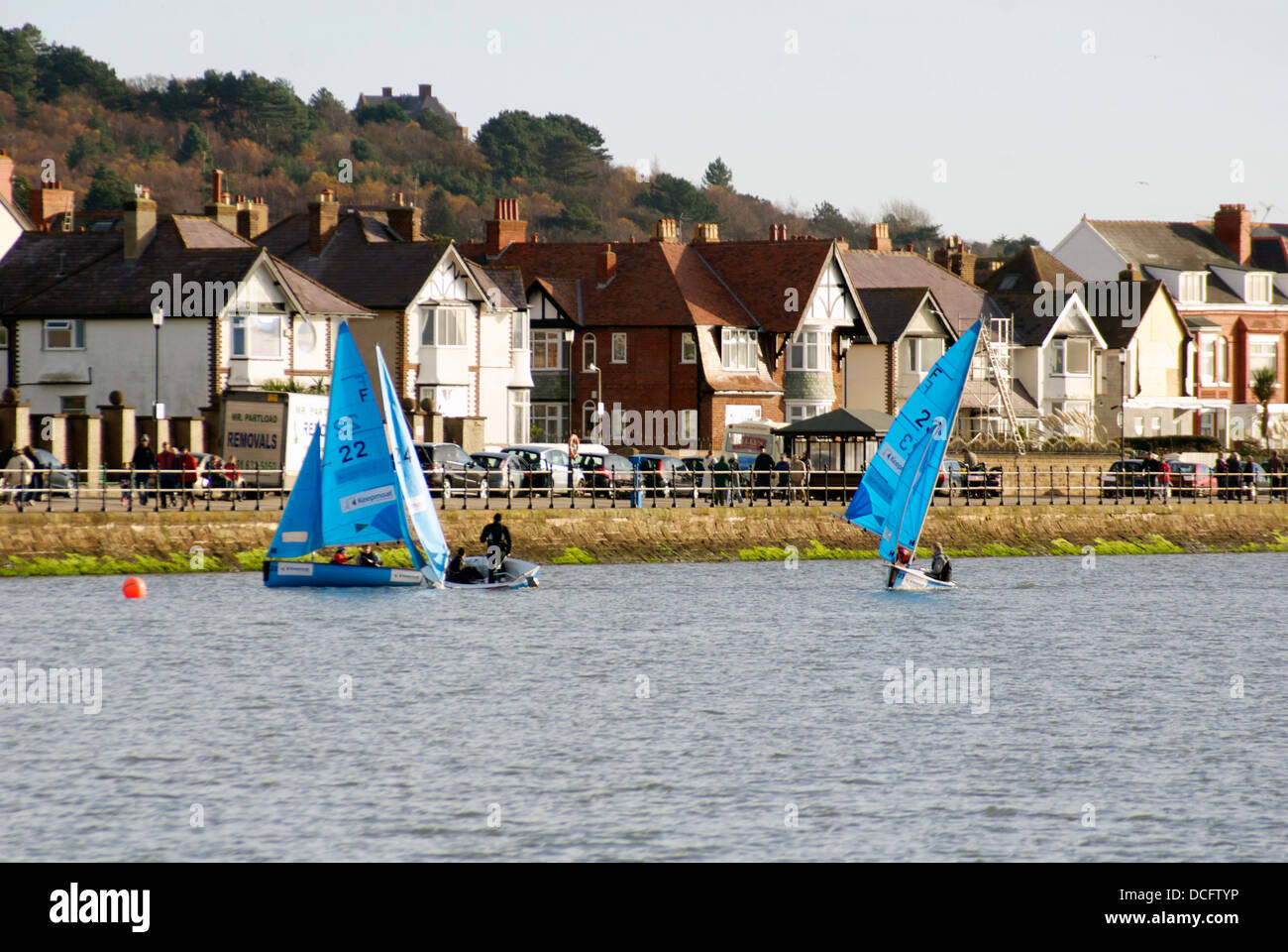 Two sailing boats on the Marine Lake at West Kirby Stock Photo