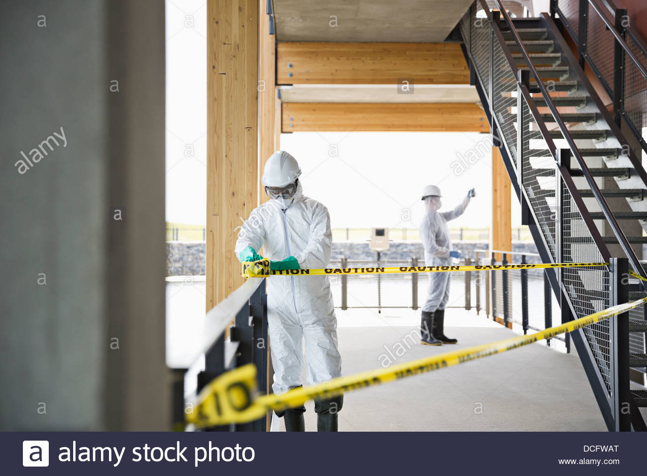 Water technicians blocking off water access Stock Photo