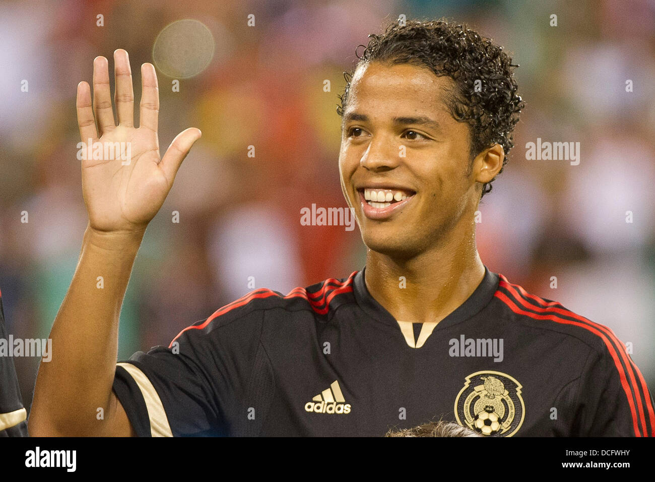 Aug. 14, 2013 - East Rutherford, New Jersey, U.S - August 14, 2013: Mexico National Team midfielder Giovani Dos Santos (10) smiles and waves to the crowd prior to the International friendly match between Mexico and Ivory Coast at Met Life Stadium, East Rutherford, NJ. Mexico defeated Ivory Coast 4-1. Stock Photo