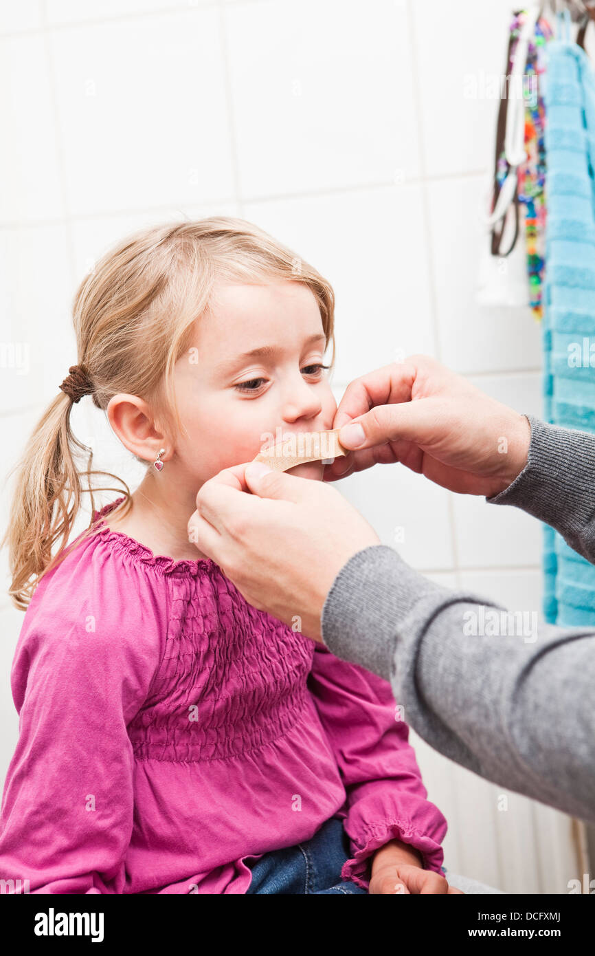 BandAid on mouth Stock Photo Alamy