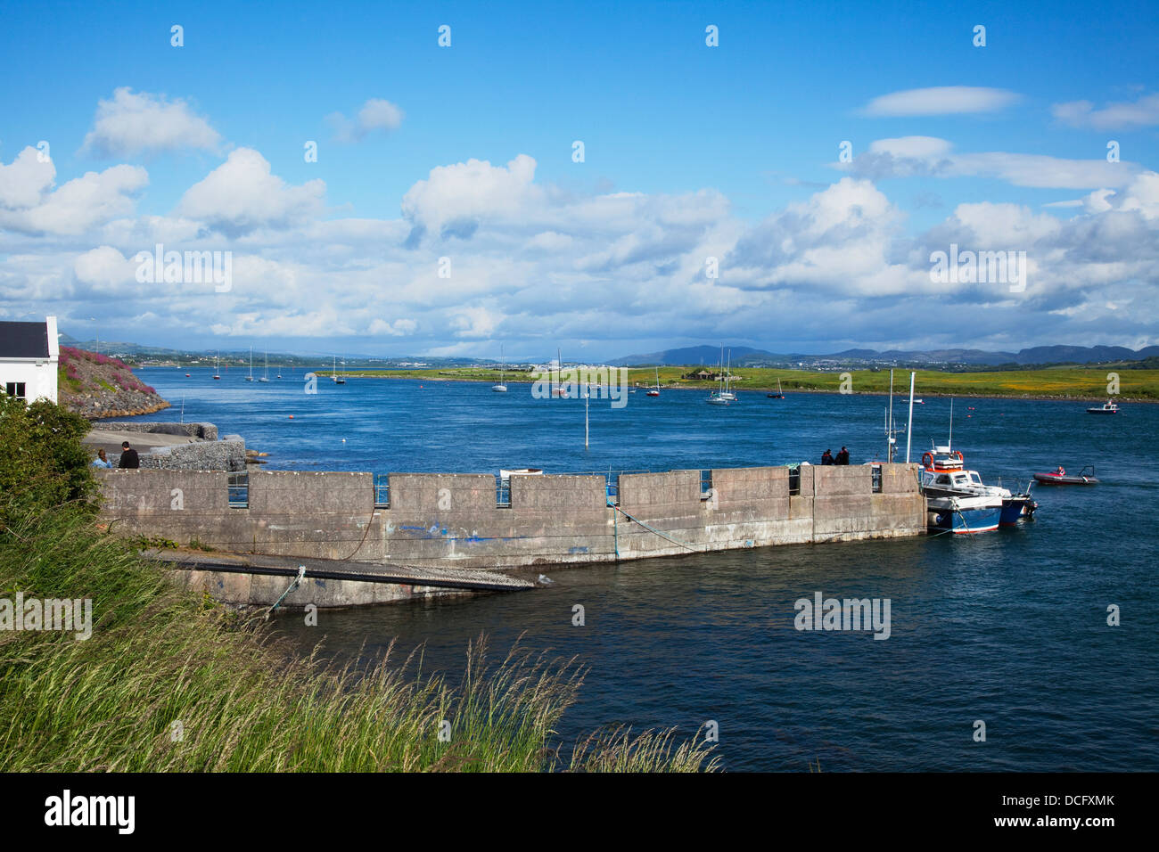 Boat At End Of Dock; Rosses Point, County Sligo, Ireland Stock Photo ...
