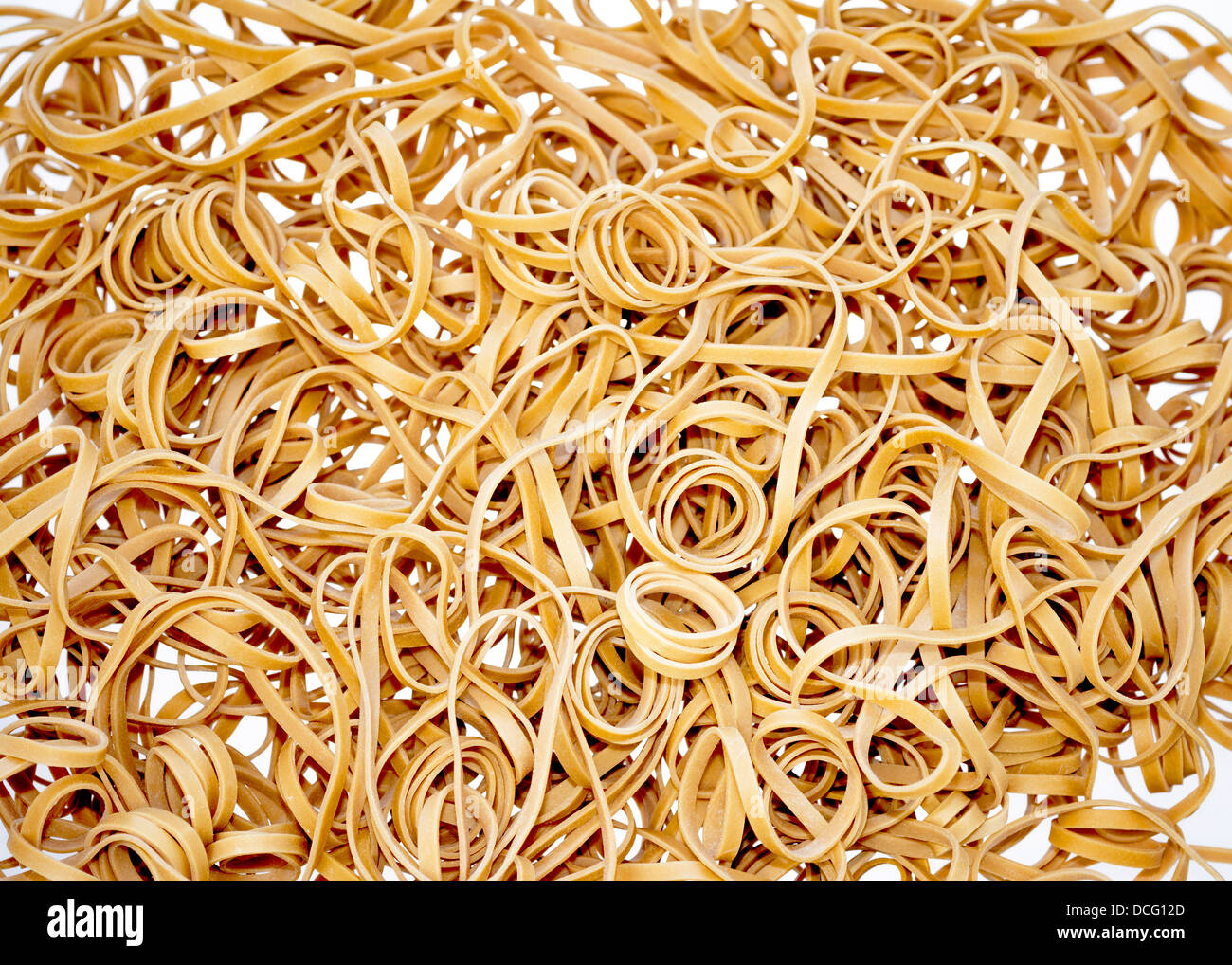 Curls of elastic rubber bands thrown together Stock Photo