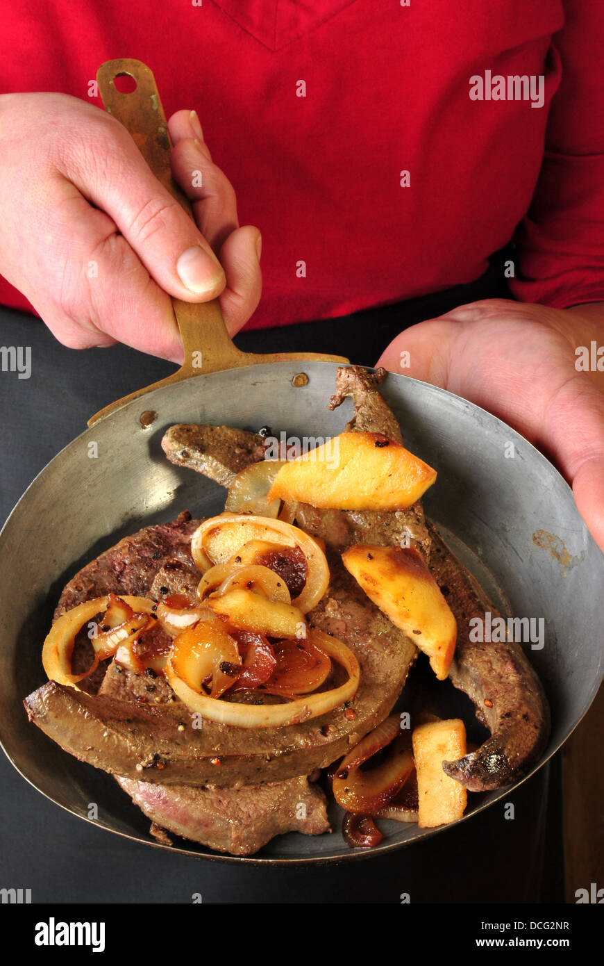 lamm liver with apple and onion rings Stock Photo