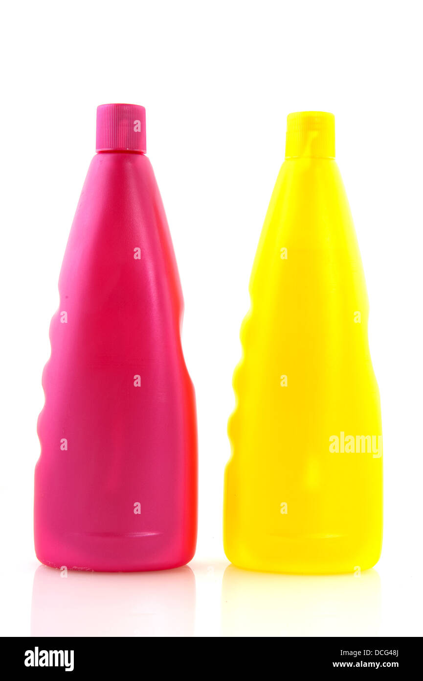 Pink and yellow shampoo bottles Stock Photo Alamy
