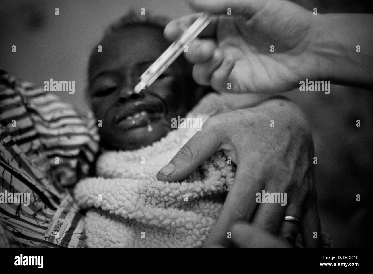 HIV positive child is treated at an orphanage in Moshi, Tanzania. Stock Photo