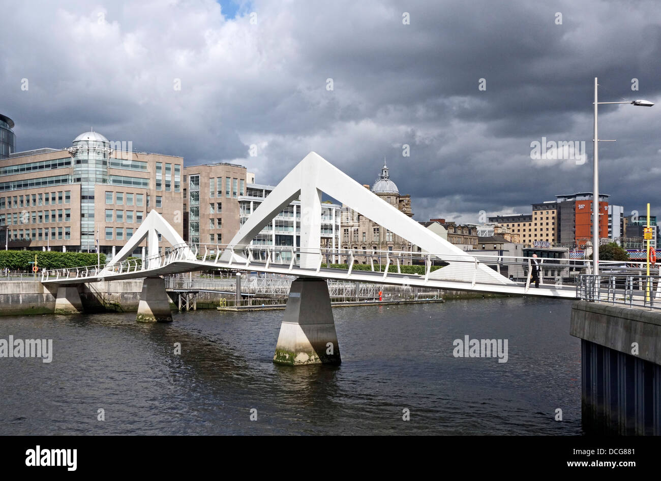 The pedestrian Broomielaw-Tradeston Bridge across River Clyde in Glasgow Scotland also affectionately named 'Squiggly Bridge' Stock Photo