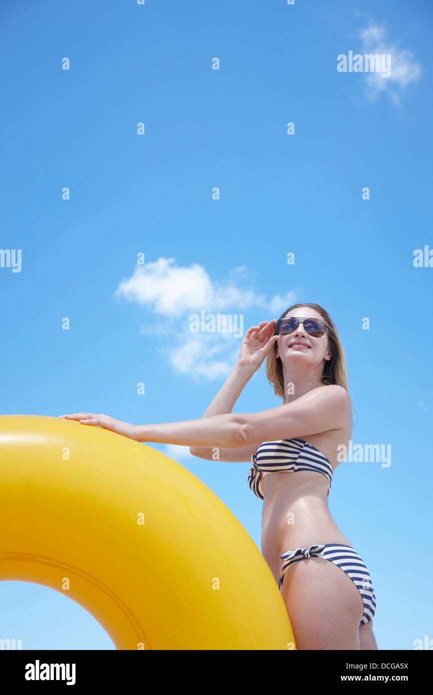 Lady in bikini beach tube hi-res stock photography and images - Alamy