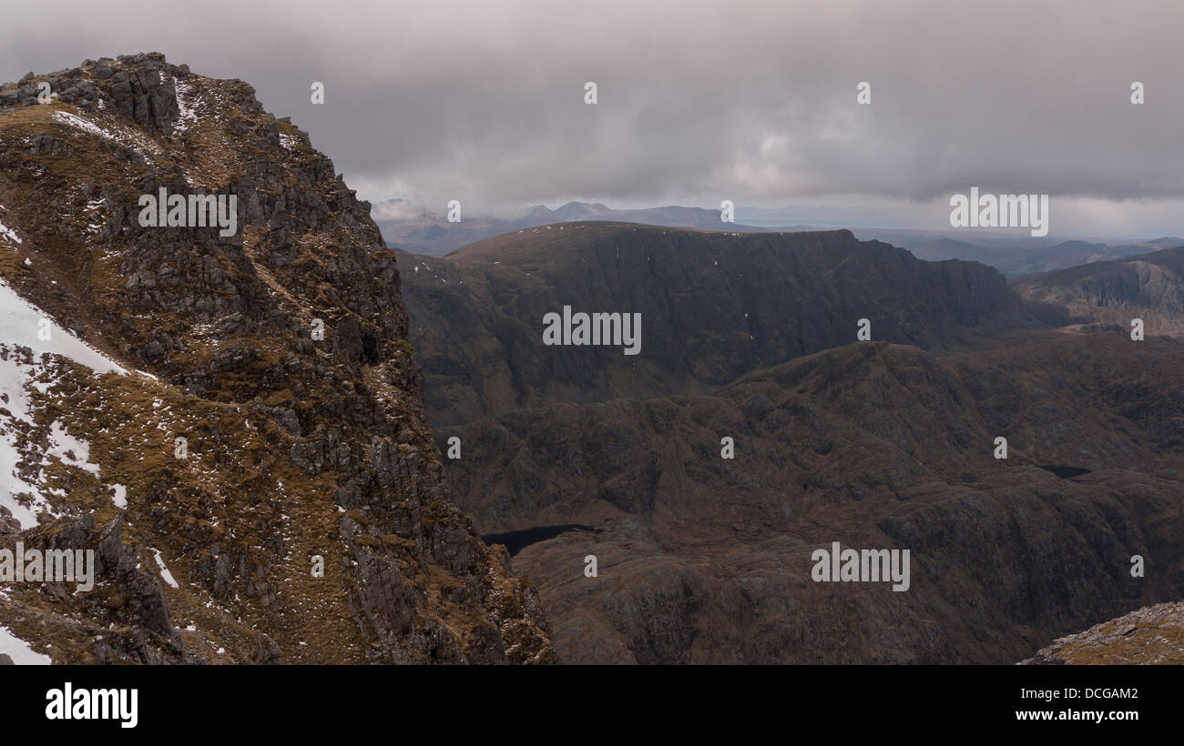 Summit of A' Mhaighdean looking towards Beinn Lair in the Letterewe Forest, Wester Ross, Highland, UK Stock Photo