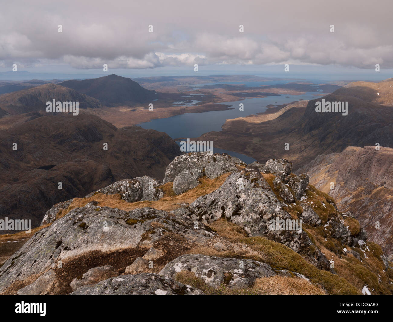 View from the summit of A' Mhaighdean with Beinn Airigh Charr in the distance and Fionn Loch and Dubh Loch below, Scotland UK Stock Photo