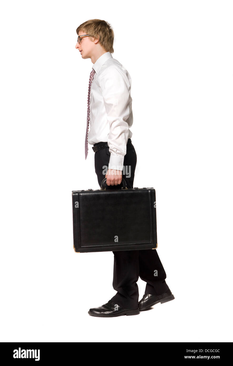 Walking man with a briefcase Stock Photo - Alamy