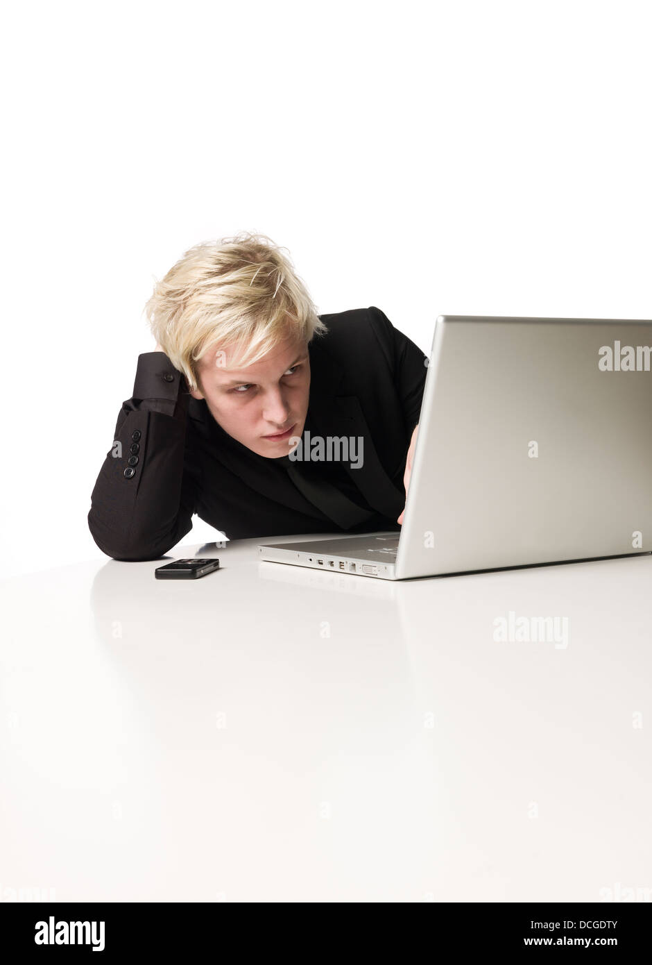 Boy reading on a computer Stock Photo - Alamy