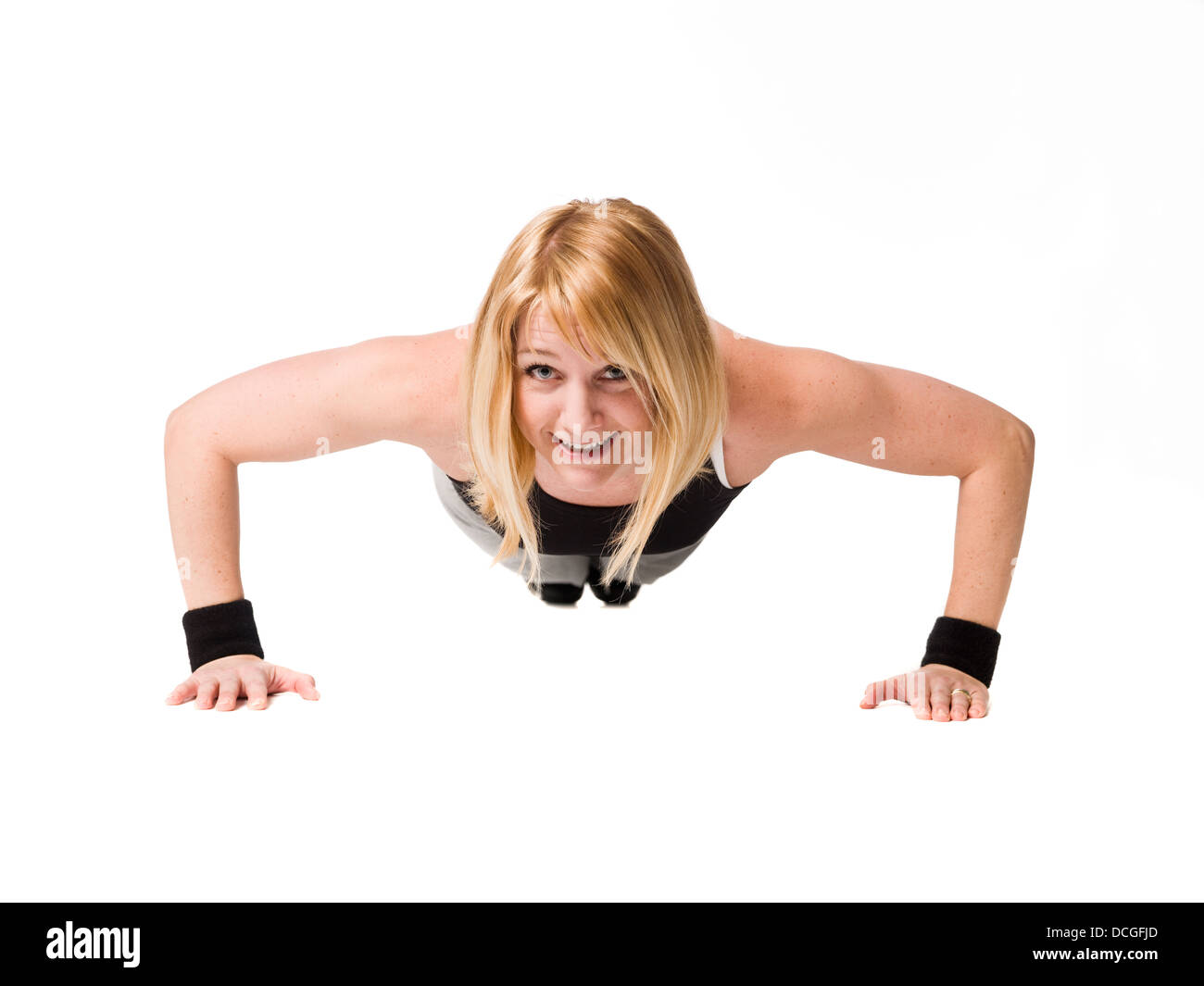 Woman doing push ups Stock Photo - Alamy