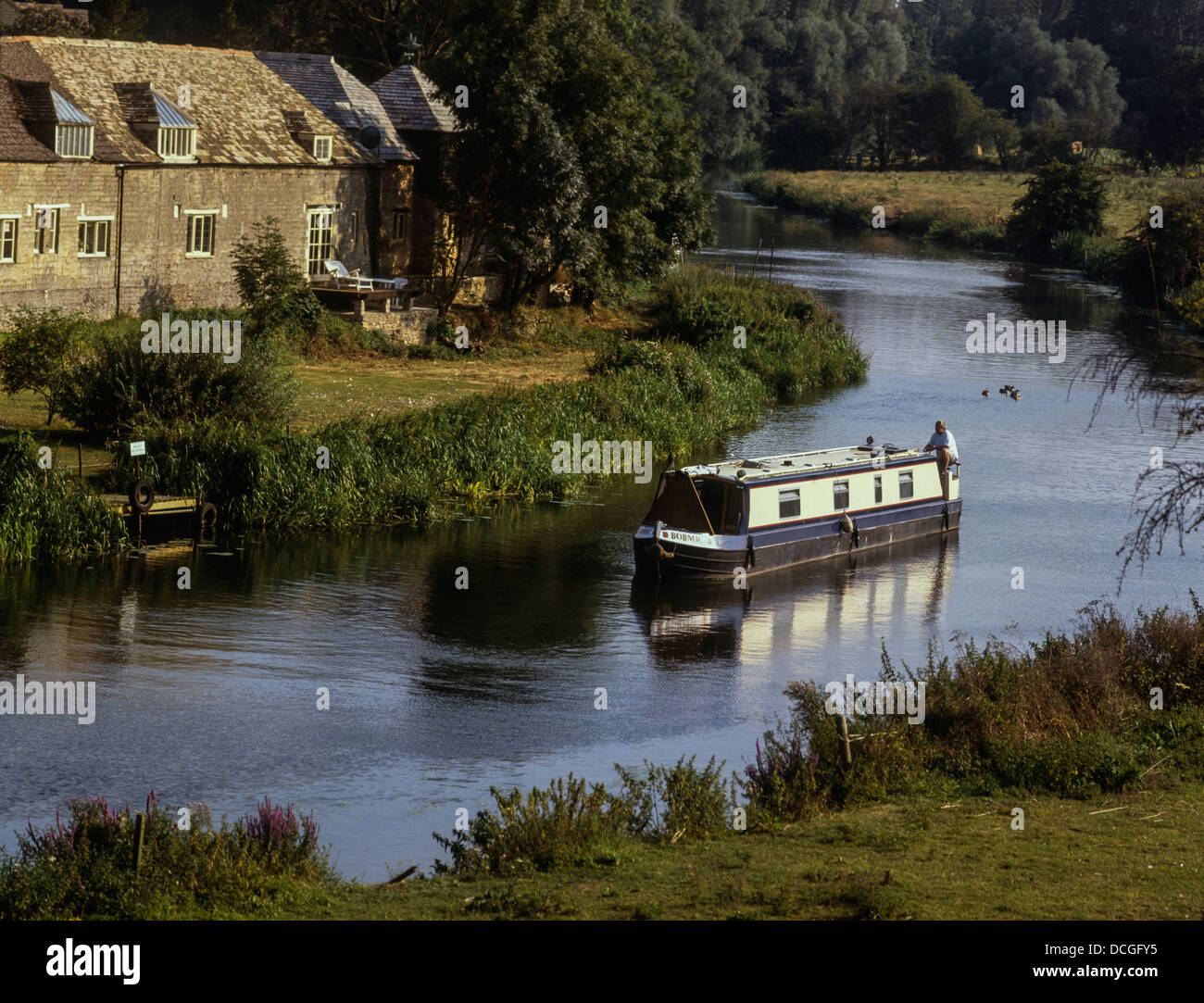 Narrowboat along the River Nene at Wansford, Cambridgeshire Stock Photo