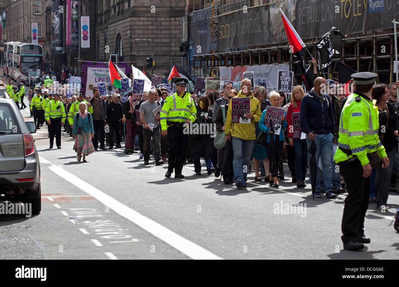 Edinburgh, Scotland 17th August 2013, March against racist and fascist groups brings  traffic to a standstill in city centre. A few streets away the Scottish Defence League (SDL) march to  Parliament. Stock Photo