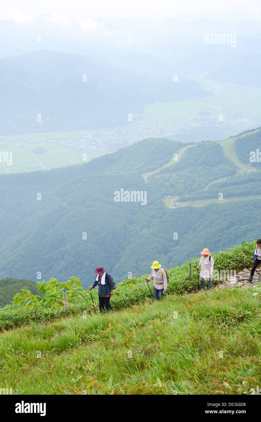 Hikers on Mount Happo near Hakubo in Nagano, Japan. Stock Photo