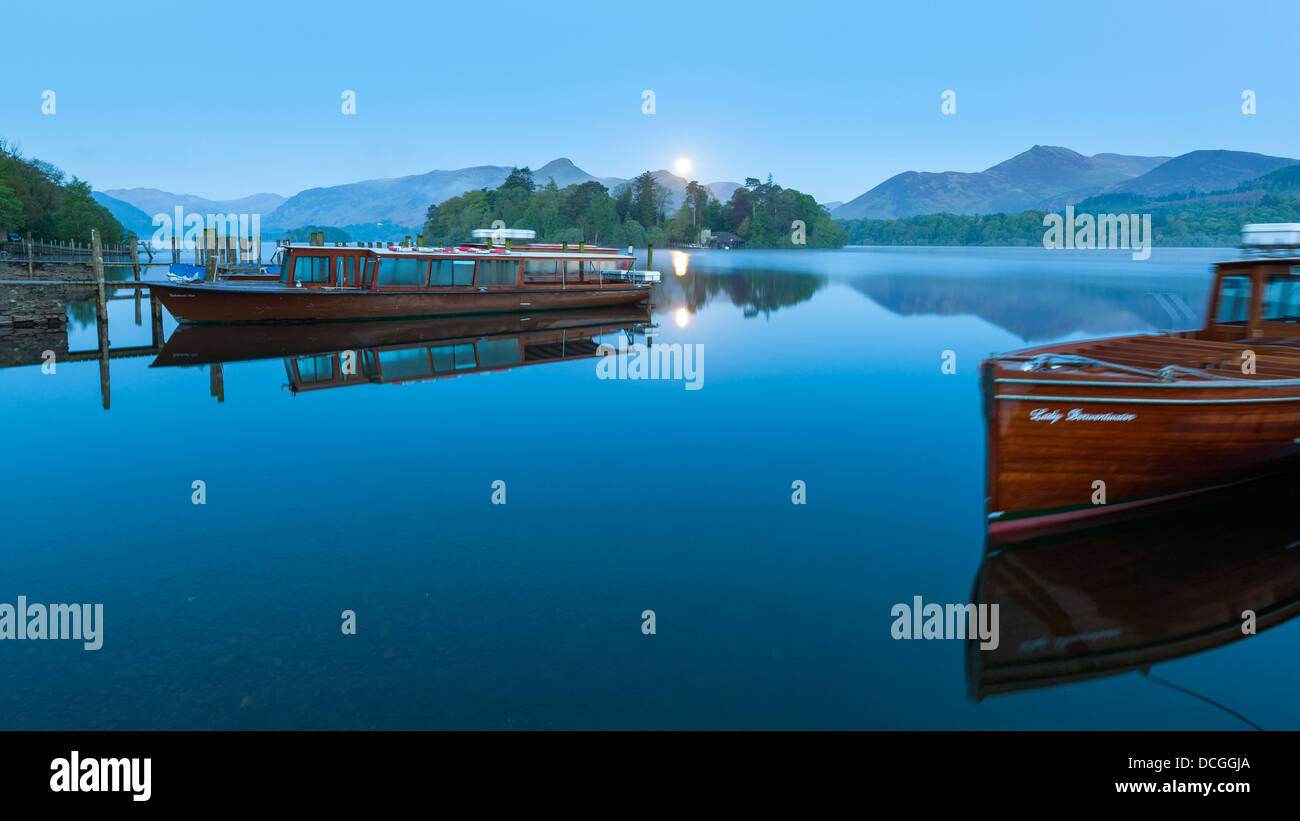 Boats on Derwent Water at sunrise, Keswick, Lake District National Park, Cumbria, England, UK, Europe. Stock Photo