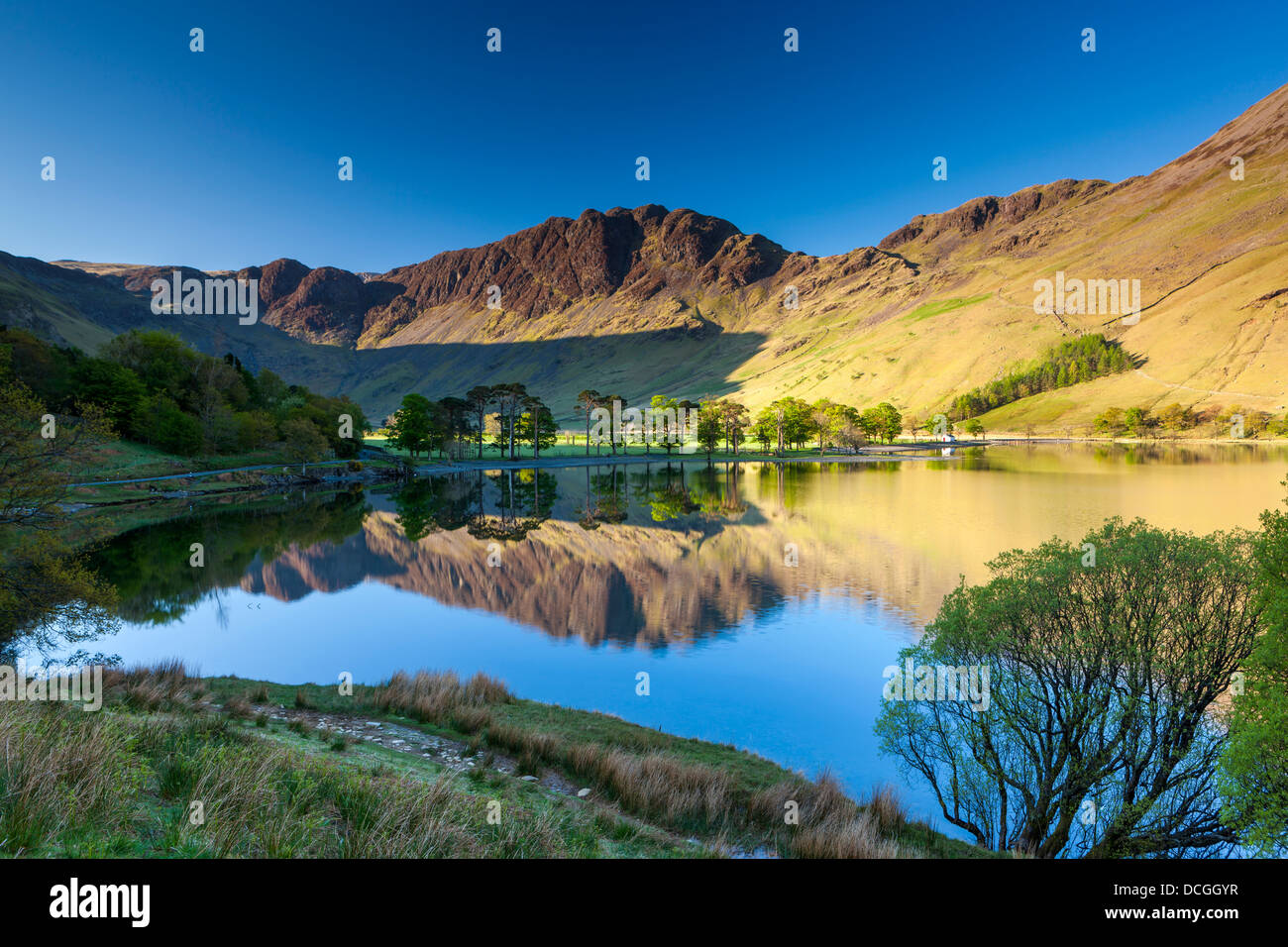 Mountains reflected on Buttermere Lake, Lake District National Park, Cumbria, England, UK