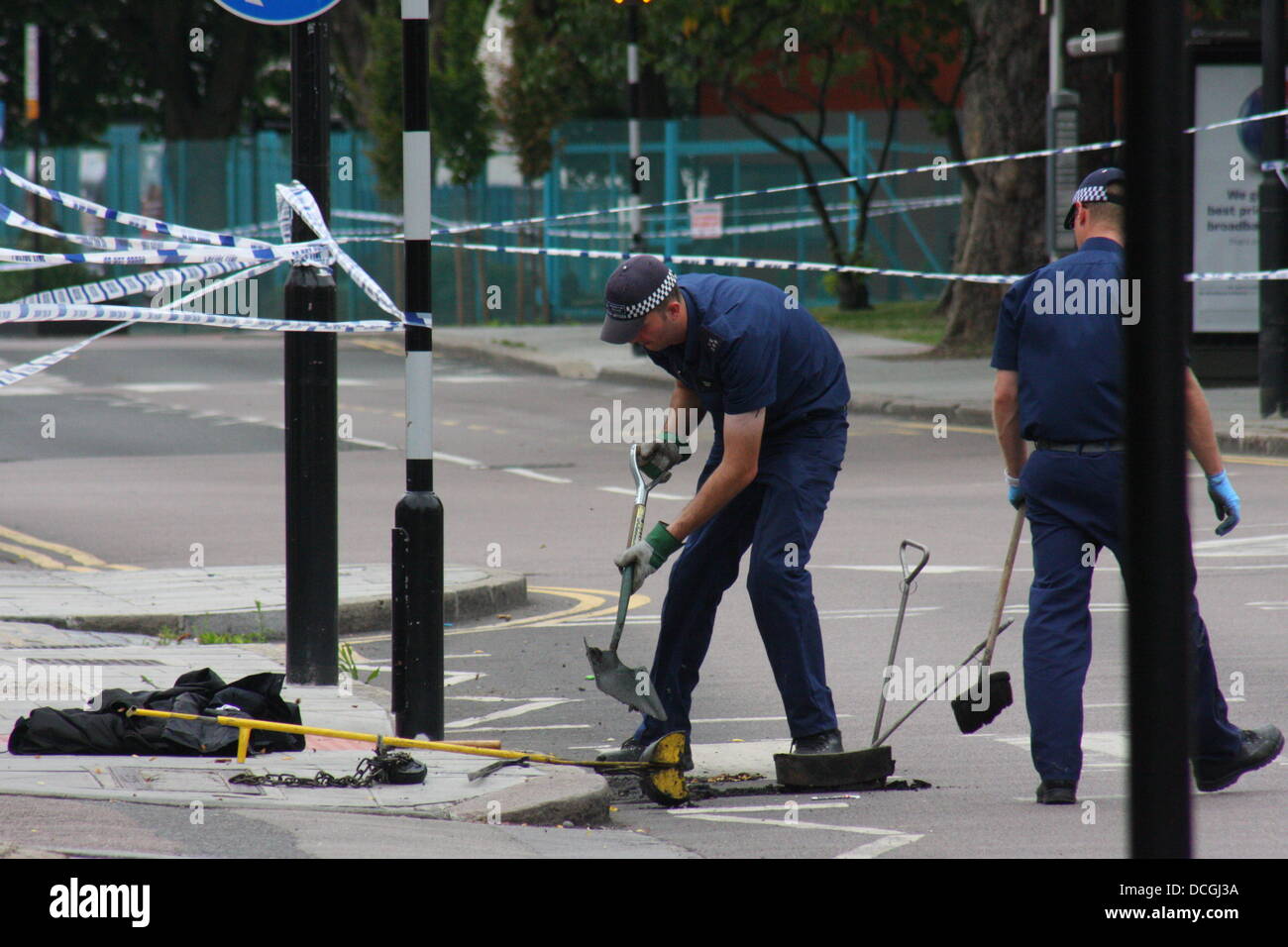 Police Investigating The Scene Of An Incident Of Two Stabbings In West ...