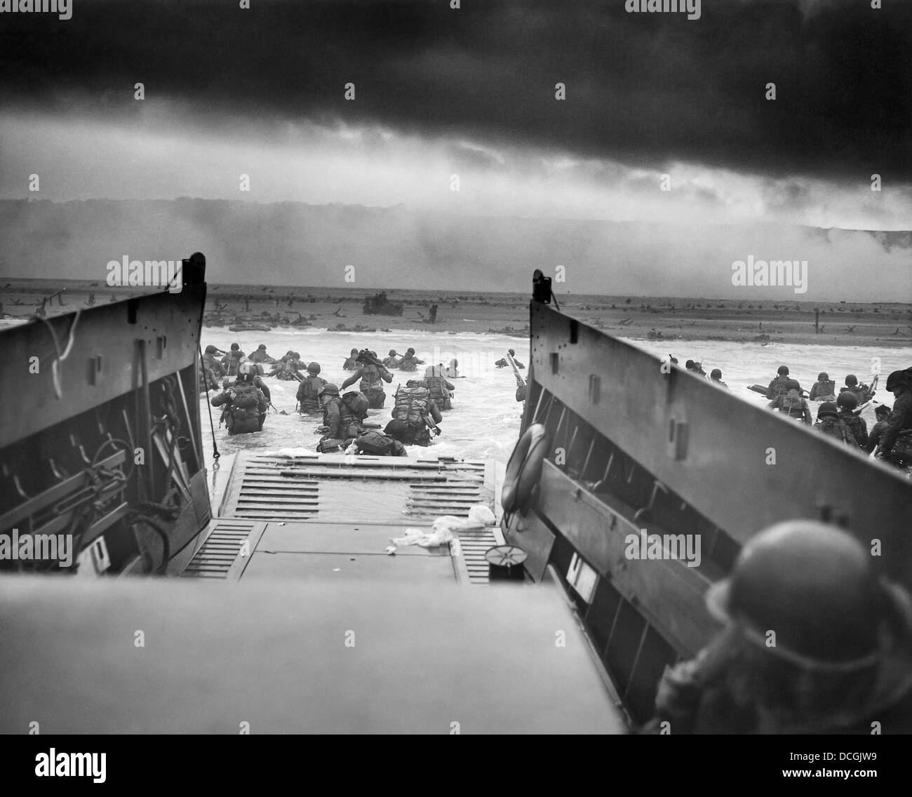 Digitally restored World War II photo of American troops approaching Omaha Beach Stock Photo