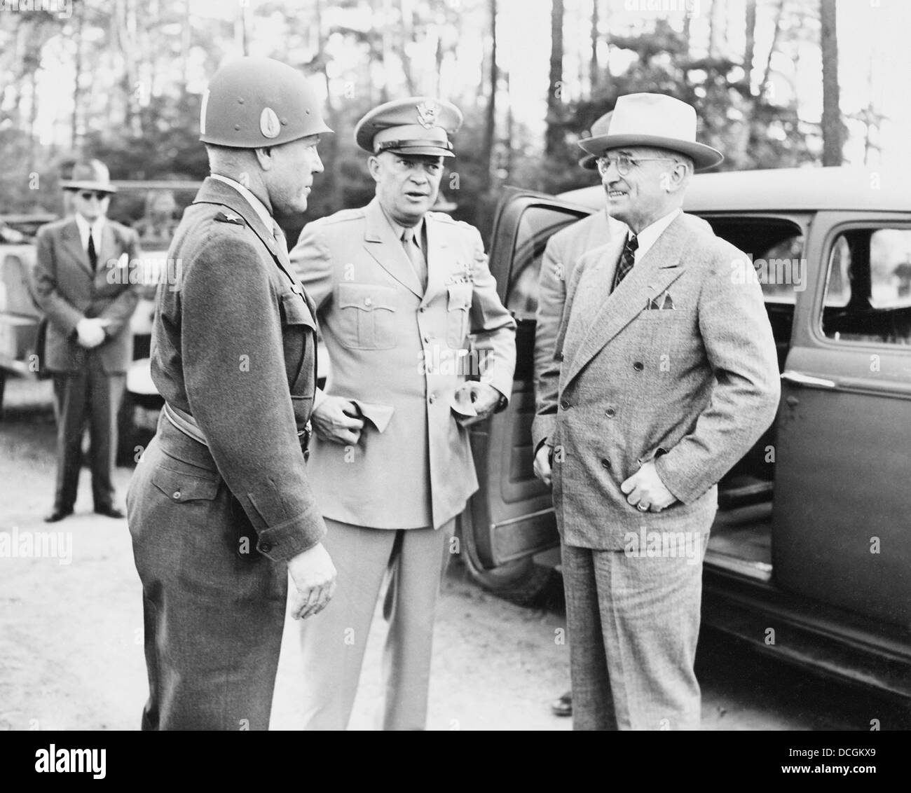 World War II photo of President Harry Truman talking to General Eisenhower and Hickey. Stock Photo