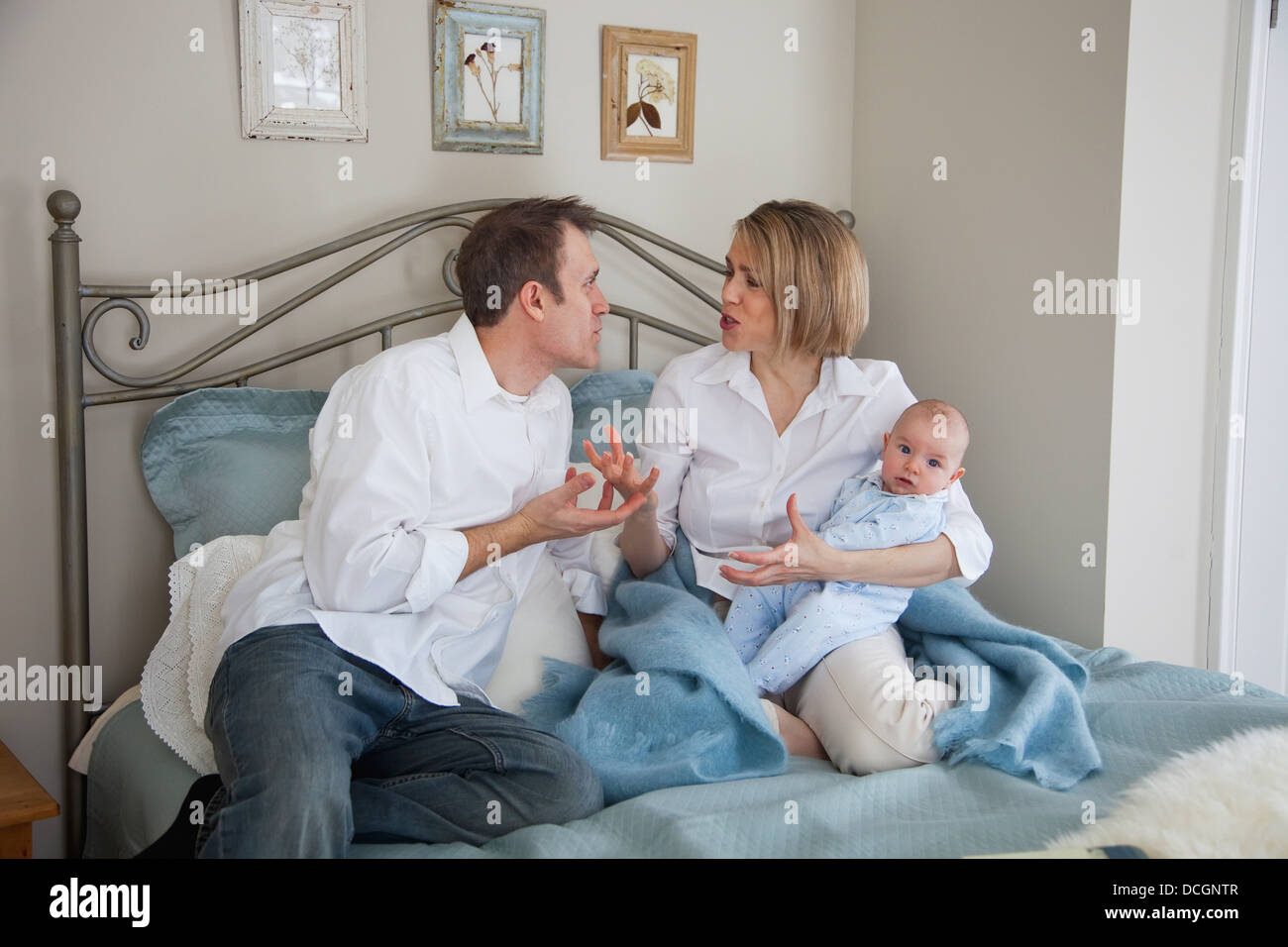 Parents Argue While Holding A Baby; Jordan, Ontario, Canada Stock Photo