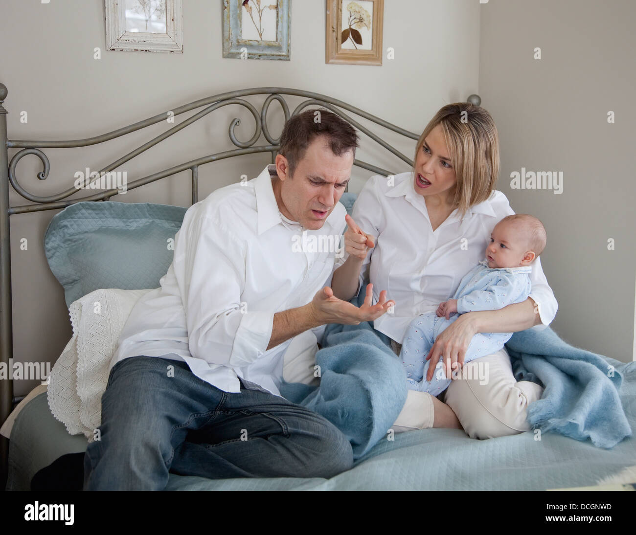 Parents Argue While Holding A Baby; Jordan, Ontario, Canada Stock Photo