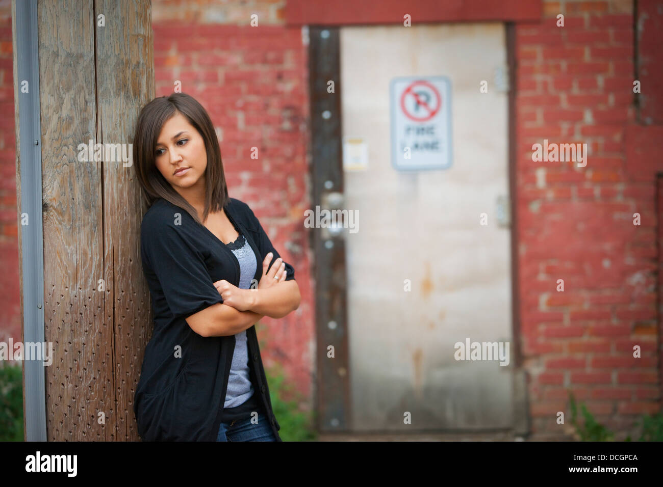 Woman stands alone hi-res stock photography and images - Alamy