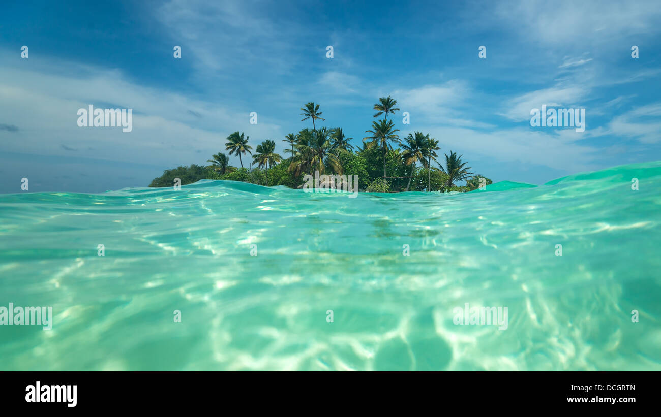 Tropical island in the ocean Stock Photo - Alamy