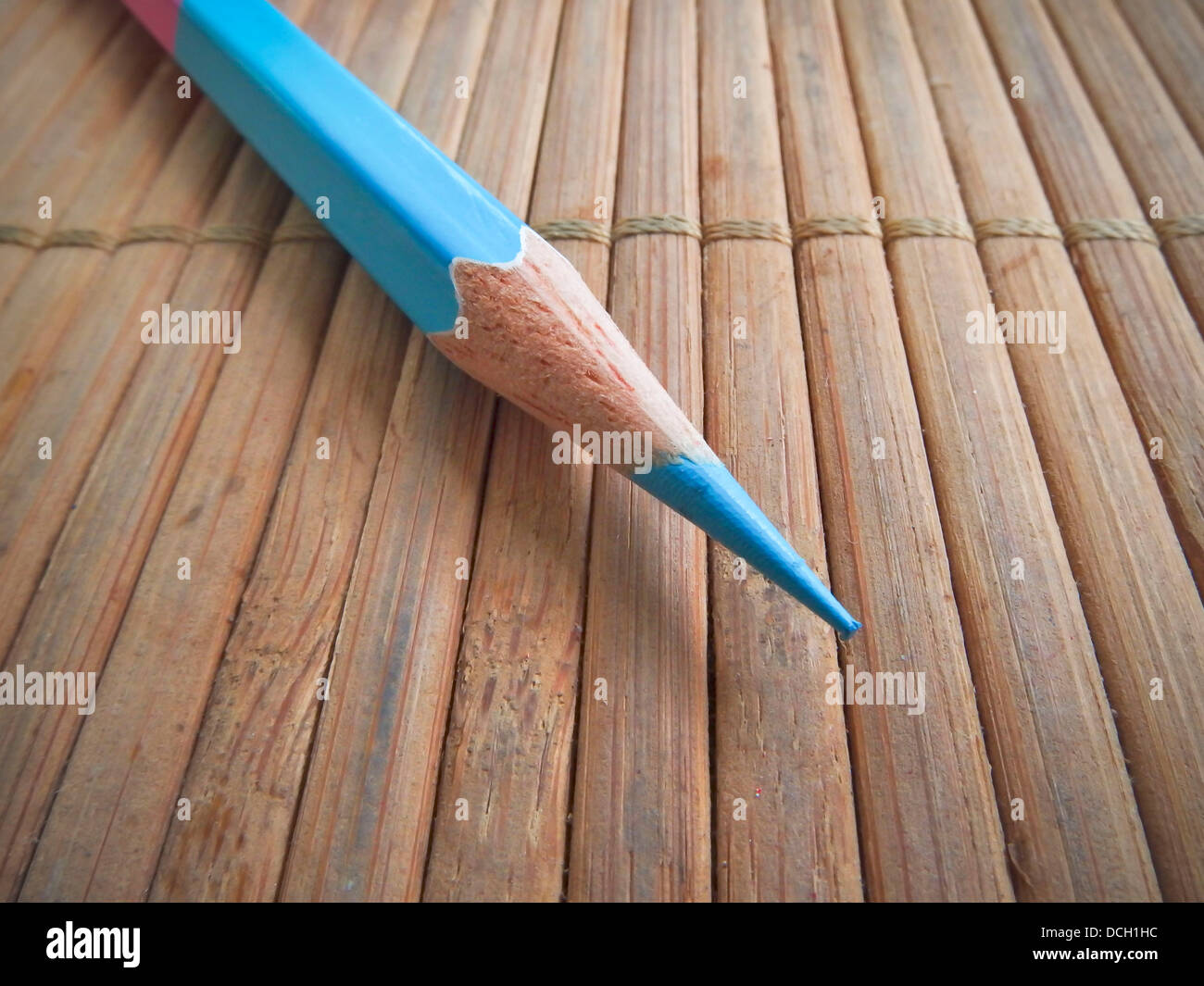 Pencil on bamboo pad background Stock Photo Alamy