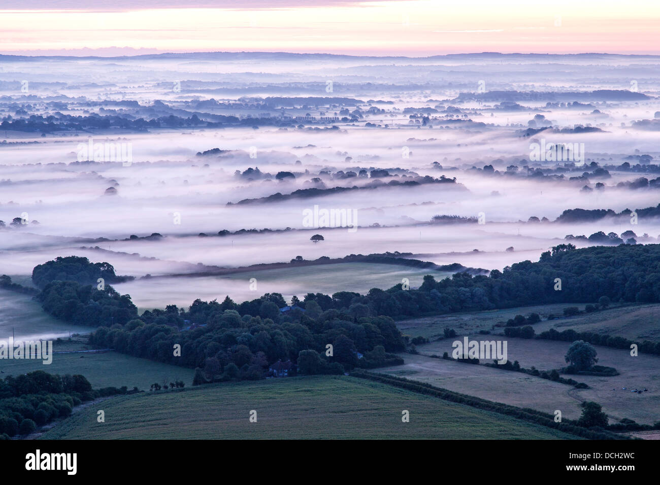 Low Lying Mist at Dawn Across the Sussex Weald Stock Photo