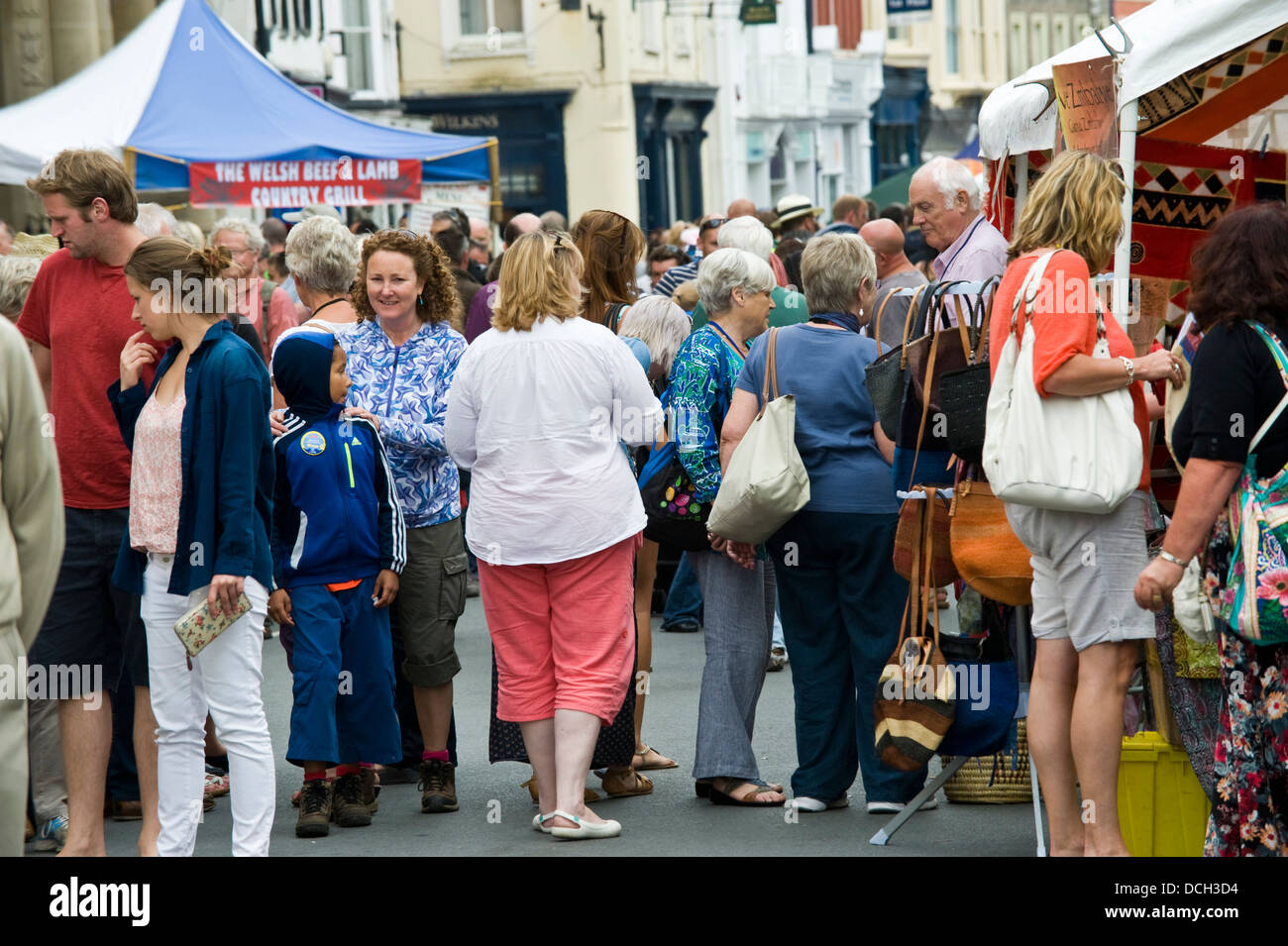 Crowds of people strolling on the street during Brecon Jazz Festival 2013 Stock Photo