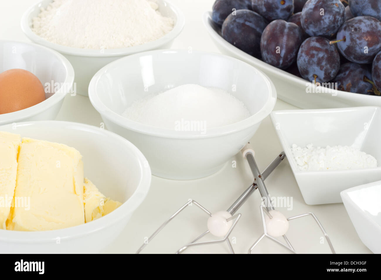 All ingredients for delicious Zwetschgenkuchen Stock Photo