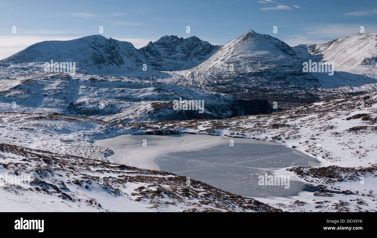 A view of the mountain An Teallach in winter from Carn a Bhreabadair, Highlands, Scotland, UK Stock Photo