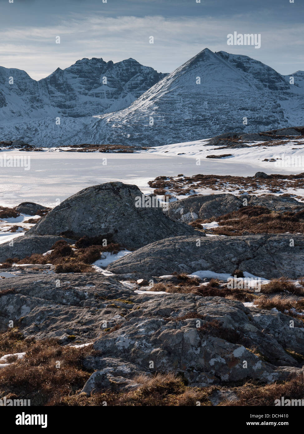 A view of the mountain An Teallach in winter from Carn a Bhreabadair, Highlands, Scotland, UK Stock Photo