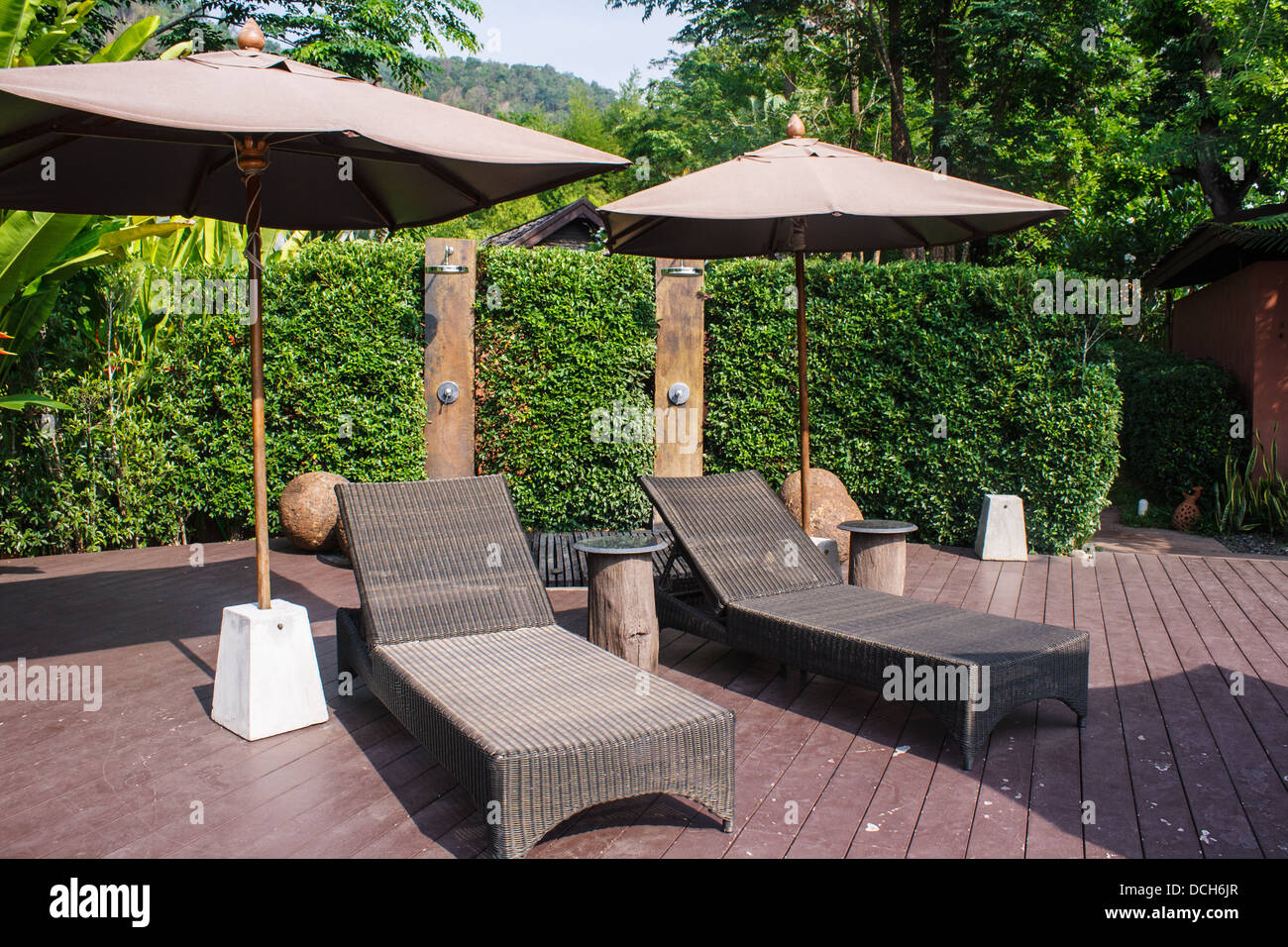 Sitting on a chair beside the pool Stock Photo Alamy