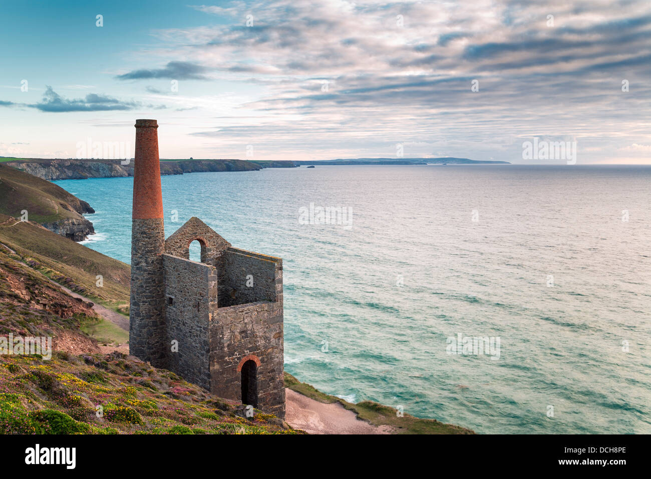The coast at St Agnes in Cornwall with the Wheal Coates tin mine perched on the edge of the cliffs. Stock Photo