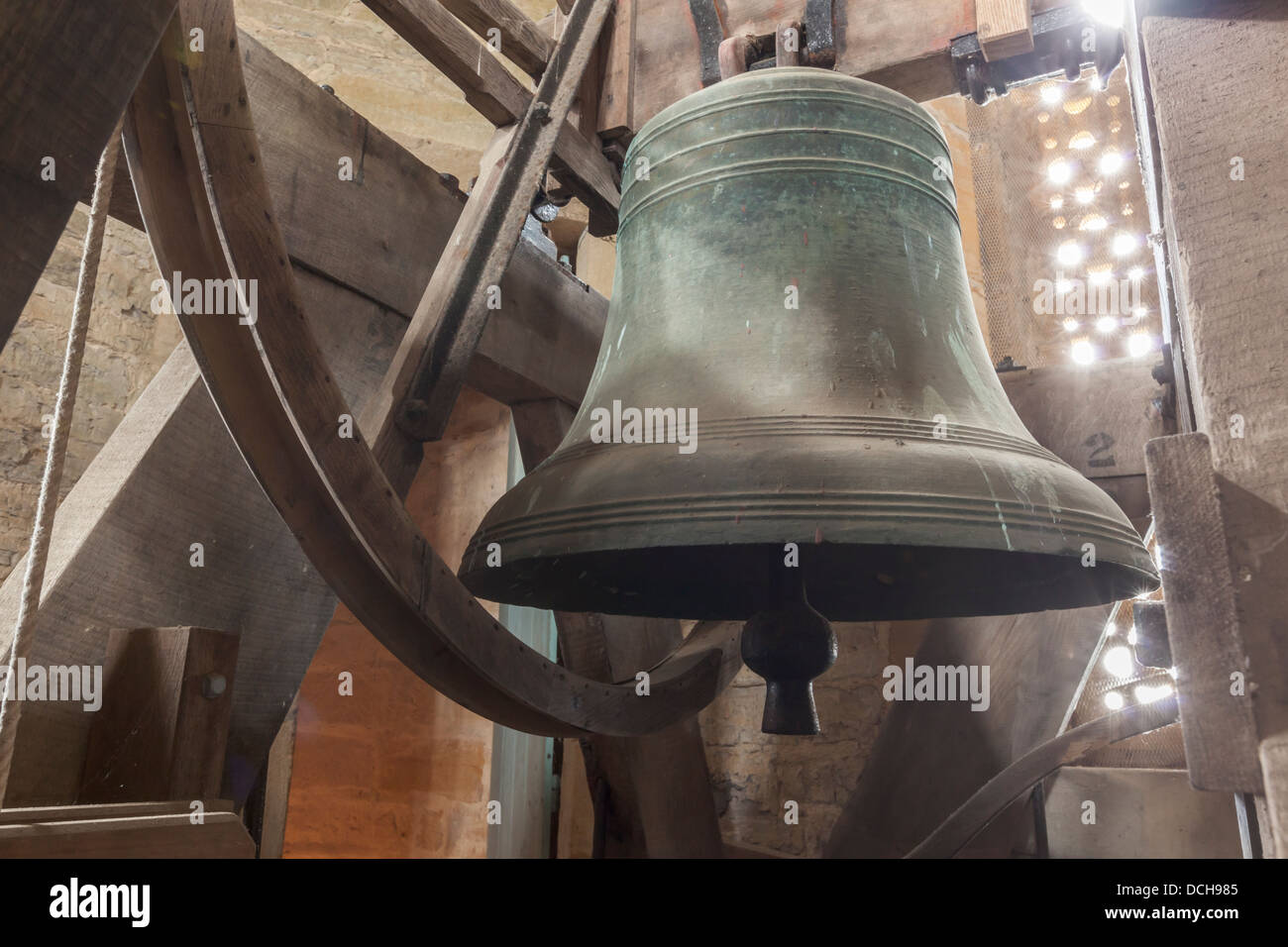 Cast iron bell in the belfry of All Saints Church, Curry Mallet made by hand during the mid 18th century. Stock Photo