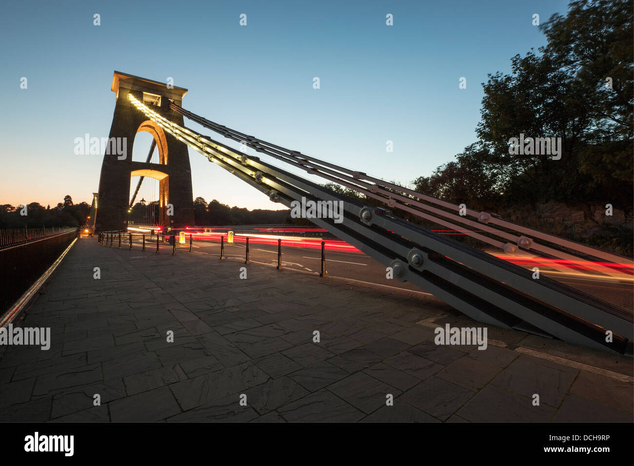 Clifton suspension bridge at dusk with traffic trails. Stock Photo